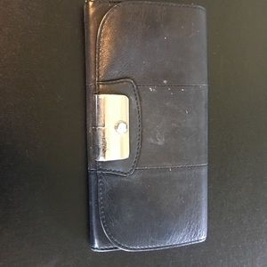 Black leather coach wallet. Fair condition.